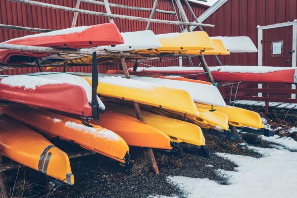 Kayaks in winter in Reine fishing village, Norway
